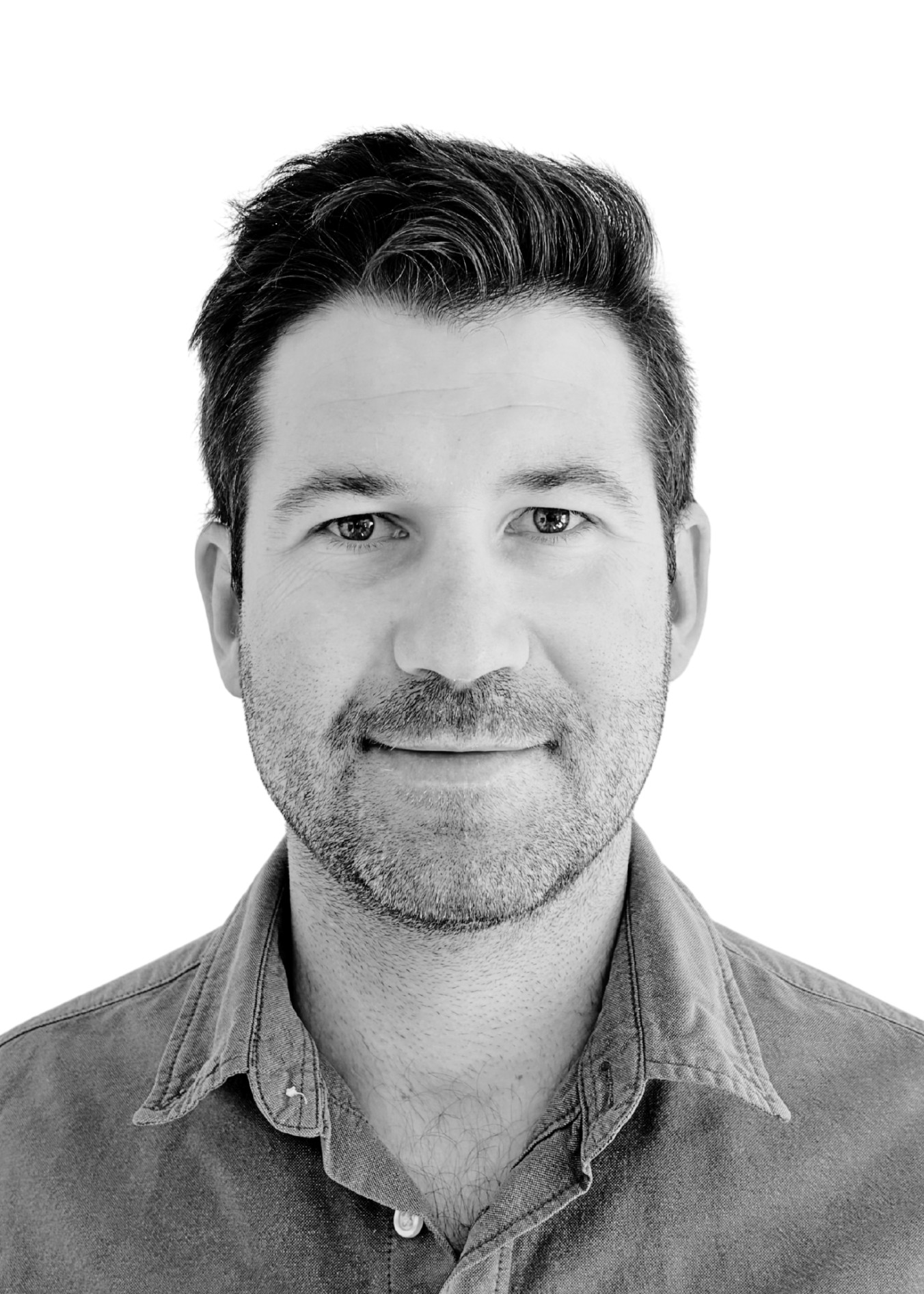 Black and white headshot of David McGibbon